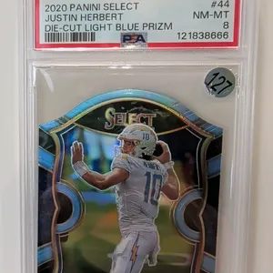A 2020 Panini Select Justin Herbert Die-Cut Light Blue Prizm Rookie Card. (Panini, 2020) A Panini Select Concourse level rookie football card #44 feat
