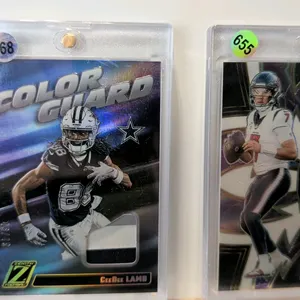 A Pair of Panini NFL Memorabilia Cards. (Panini, 2023-2024) A collection of (2) serial-numbered NFL trading cards with jersey relics. Includes a 2024 