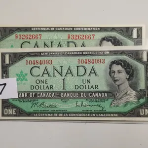 Two UNC 1967 Ser # $1 Bills