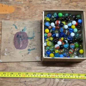 Box full of various marbles