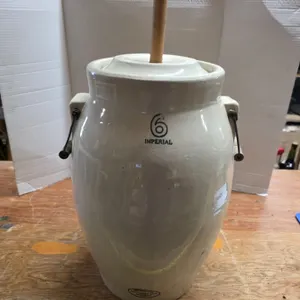 #6 butter churn- has small crack