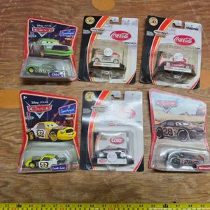 Sealed disney and matchbox  diecast cars