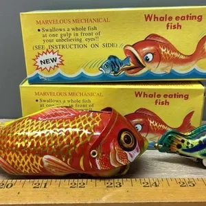 2 Tin Fish Toys. China.