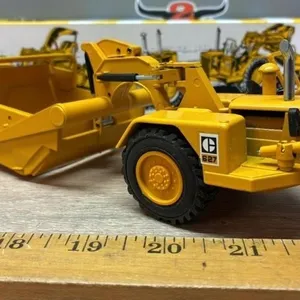 NZG 1:50 Caterpillar 627 Push-Pull Scraper