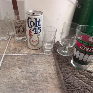 Bucket of misc glasses
