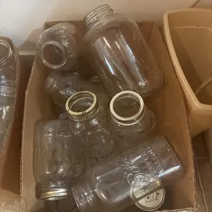 Cardboard box of large canning jars