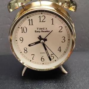 Timex Easy Reader Quartz Twin Bell Alarm Clock With Gold-Tone Metal Case, Clean Battery Compartment,