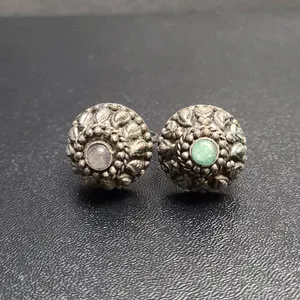 Ornate Silver Rings with Raised Floral Motifs and Center Gemstone Accents, Unmatched Stones, Size Ad