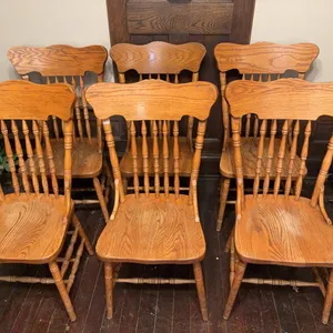 Six Oak Spindle Back Chairs