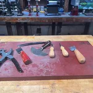 LEATHER WORKING TOOLS AND TOOLING SURFACE