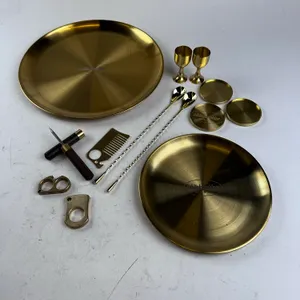 ASSORTED BRASS ITEMS — TRAYS, KNUCKLES, COASTERS & SPOONS