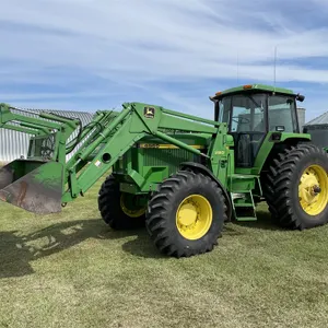 1993 JOHN DEERE 4560 MFWD Tractor w/ JD 280 FEL, Bucket, & Grapple, 7,235 Hours