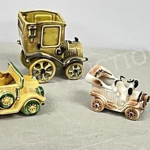3- ceramic car theme planters, 5"- 8" long