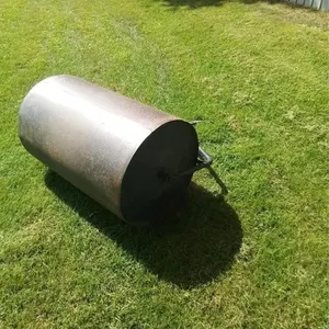 Older lawn roller. 24" high by 36" wide 1/8 "