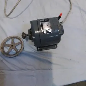 Small electric motor. With pulleys