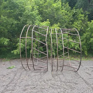 2 steel round bale feeders