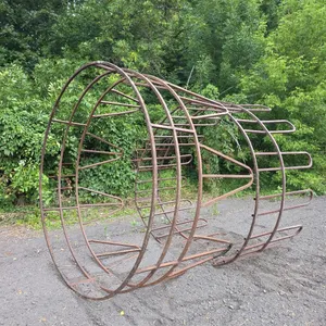 2 steel open top round bale feeders
