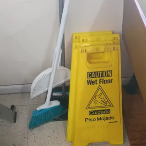 Janitorial supply lot. Includes (4) Impact yellow folding caution wet floor signs, an upright lobby dustpan, and a broom.