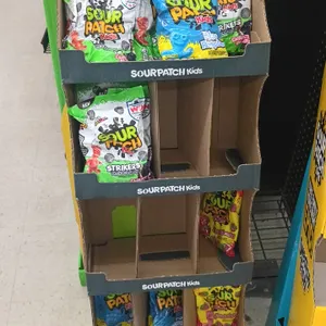 Sour Patch Kids 4-tier corrugated cardboard retail floor display stand. Features Sour Patch Kids Strikers soccer themed graphics. Contents not include