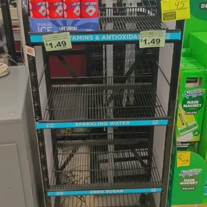 Metal 4-tier rolling display rack. Features Sparkling Ice branding, 4 wire shelves, shelf price tag channels, and top sign holder. 24"L x 19"W x 60"H.