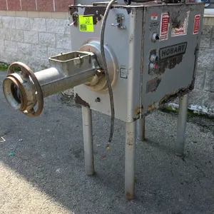 Hobart 4146 commercial meat grinder. Features a 5 HP motor. S/N: 11-334-824. Electrical: 200V, 60 Hz, 3-Phase, 20.0 A. Mounted on tubular legs. Note: 