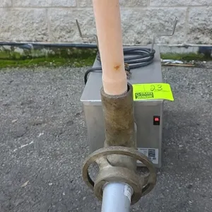 2014 Pro-Cut KG-12FS countertop meat grinder. Features stainless steel housing, grinder head assembly, sausage stuffing tube, and meat stomper. S/N: E