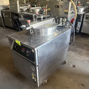 2011 BKI FKM-F commercial electric pressure fryer. Features stainless steel construction, round fry pot with wire basket, locking pressure lid assembl