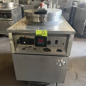 BKI FKM-F commercial electric pressure fryer. Features stainless steel construction, circular fry pot with wire basket, locking pressure lid, digital 