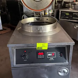 2013 BKI FKM-F commercial electric pressure fryer. Features stainless steel construction, round fry pot with wire basket, locking lid assembly with pr