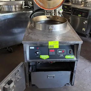 2008 BKI FKM-F electric pressure fryer. Features stainless steel construction, digital controls with analog thermostat, locking pressure lid, round wi