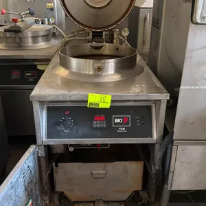 2013 BKI FKM-F electric pressure fryer. Features stainless steel construction, round fry pot with locking lid, digital control panel, and pull-out fil