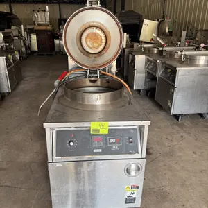 2011 BKI FKM-F commercial electric pressure fryer. Features digital controls with thermostat dial, locking pressure lid, internal wire fry basket, and