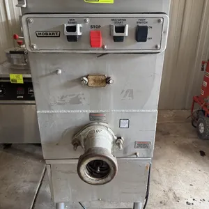 Hobart 4246HD meat mixer/grinder. Features stainless steel construction, mixing paddles, grinding auger, and push-button control panel with foot switc