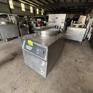 2010 BKI FKM-FC electric pressure fryer. Features digital touchpad controls, round fry pot with insert basket, locking lid assembly, and stainless ste
