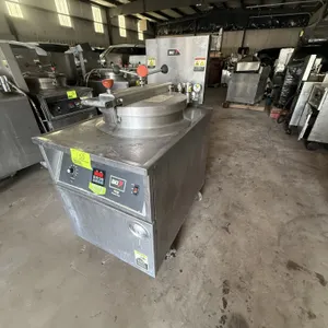 2008 BKI FKM-F commercial electric pressure fryer. Features round wire fry basket, locking hinged lid with pressure gauge, digital controls, and lower