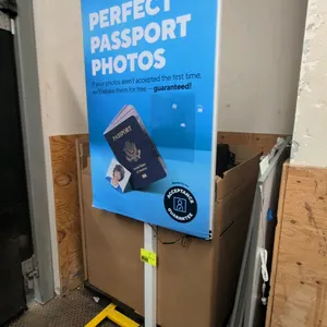 Omni Fixed #19 LED portable metal illuminated sign stand. Features an LED backlit display frame with flip-up graphic cover. 30" x 78"H. Mounted on a y