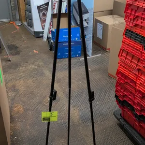 Metal tripod display easel. Features folding black metal construction and adjustable sign brackets. 65"H.
