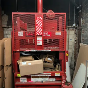 Philadelphia Tramrail vertical baler. Features right-hand swing door latch mechanism and safety mesh upper gate. 64"W. Electrical: 208V, 3-Phase, 60 H