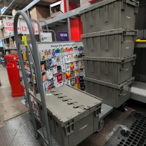 Metal 6-wheel U-boat platform cart. Features a diamond plate deck and dual tubular steel upright handles. 5'L. Mounted on 6 casters. Contents not incl