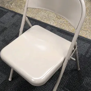 Metal folding chairs. Features tubular steel frame construction, contoured metal seat and backrest, and beige finish. Foldable design with protective 