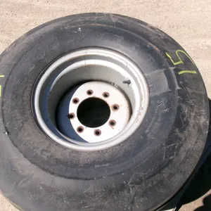 2-14L X 16.1 4 RIB TIRES on 8 BOLT MASSEY RIMS (2x your bid