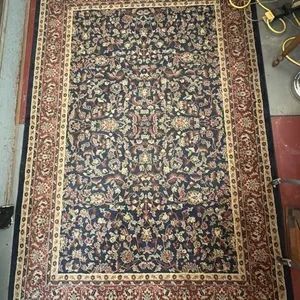Area Rug 62.5” x 90" 
- pet hair present