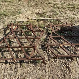 Two diamond harrows with hitch