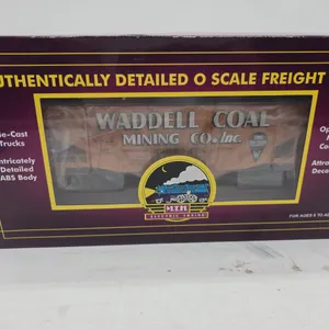 Vintage m t h brand wadell coal two bay.Fish belly hopper car with coal in original box