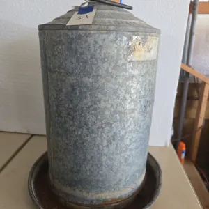 Vintage five gallon galvanized chicken watering can
