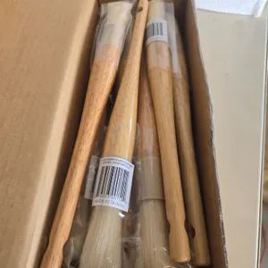 Twelve one inch wooden basting brushes