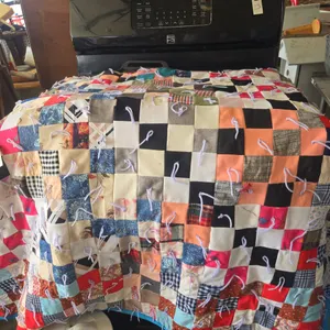 Vintage twin size tie knotted quilt