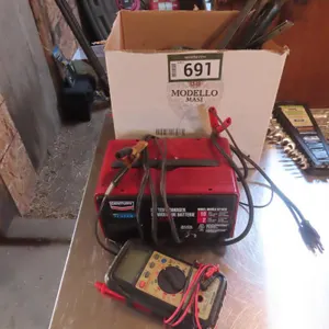 Lot - Century Model 87102C Battery Charger, Box of Assorted Tools, Mastercraft Multimeter *Located at Spruce Grove location.
