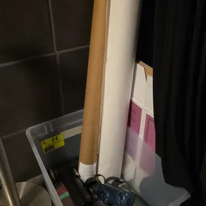 Quantity of assorted items, poly bin with water bottles, paper roll, and more