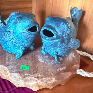 Cast Metal Fish Figurines on Wooden Serving Board